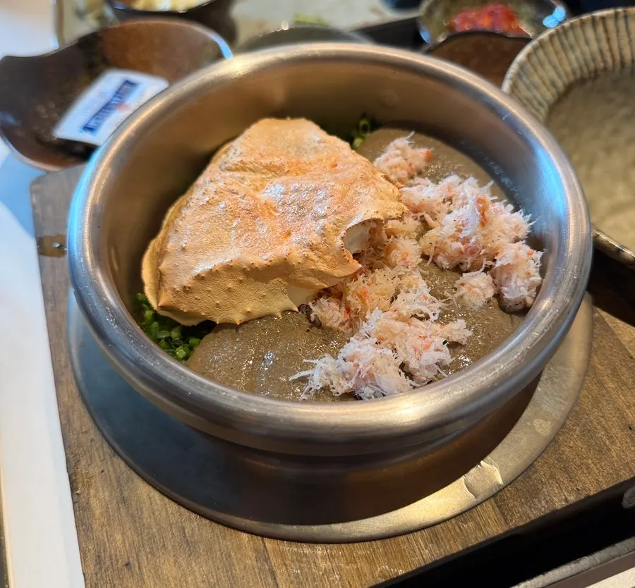 Crab pot rice topped with crab tomalley sauce