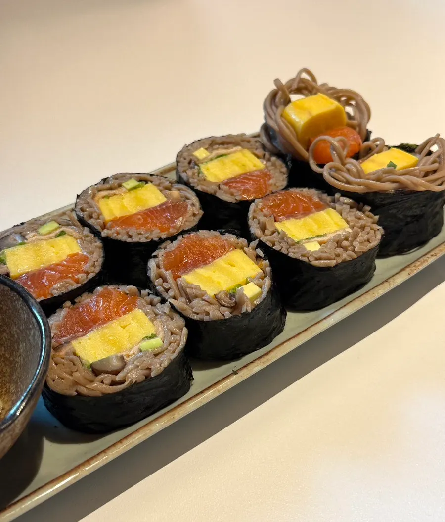 A plate of raw salmon buckwheat gimbap at Sorori Sotbap
