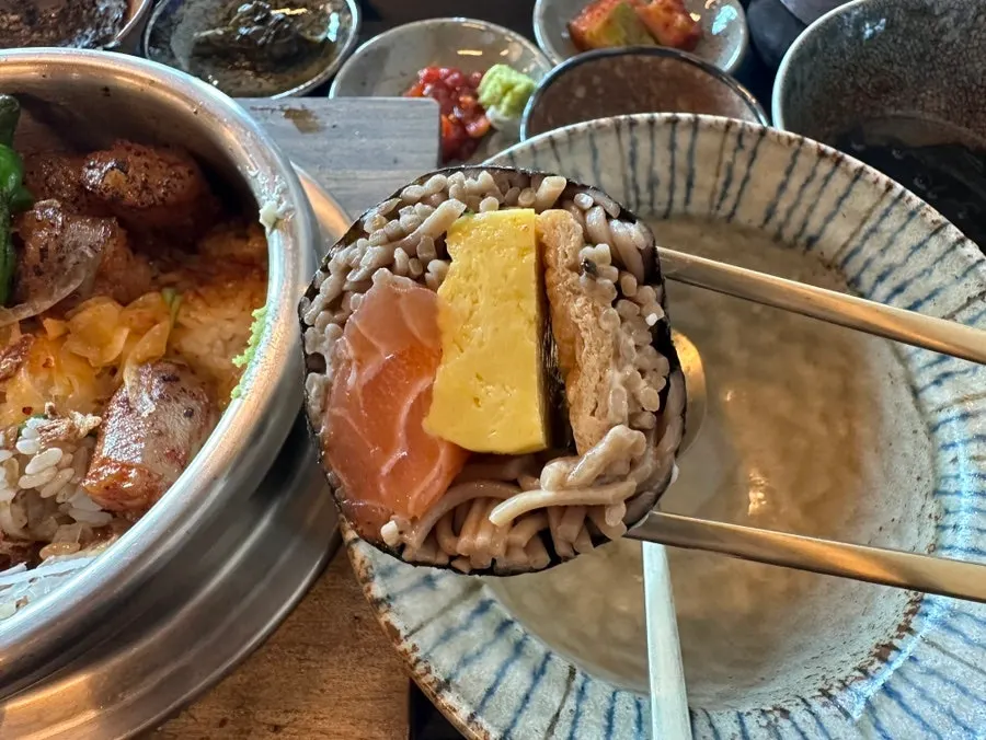 Cross-section of buckwheat gimbap showing salmon and egg