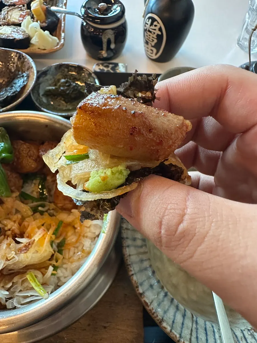 A piece of beef intestine paired with wasabi