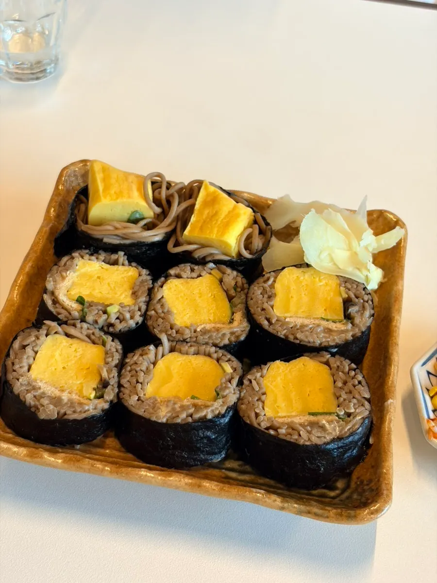 Ordered buckwheat gimbap and pot rice spread