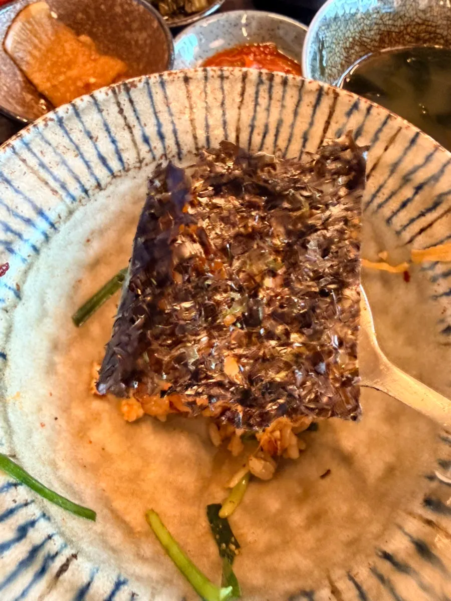 Rich seaweed soup with seafood inside