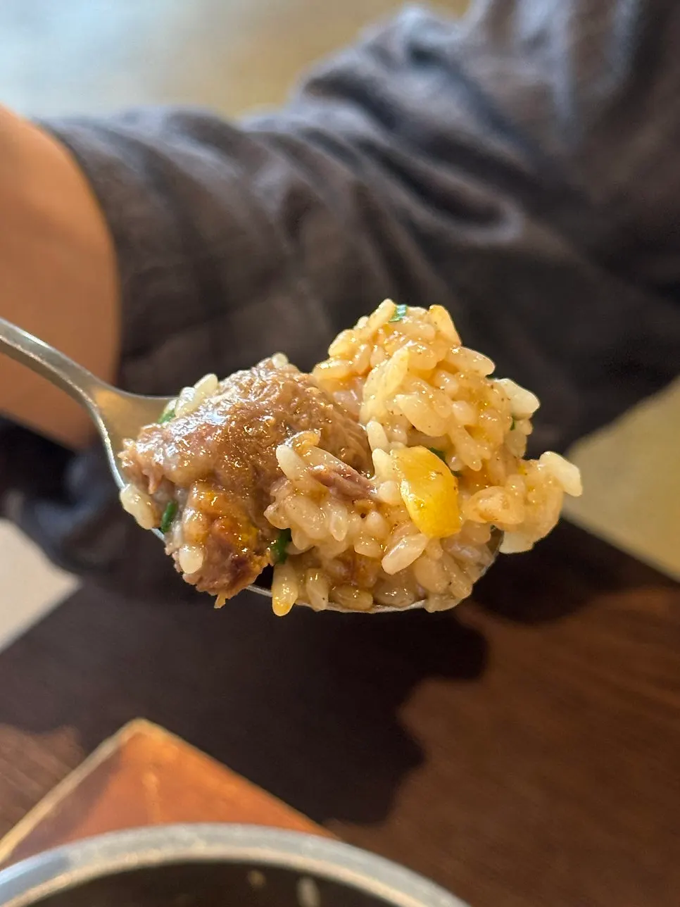Mixing butter into the short rib pot rice