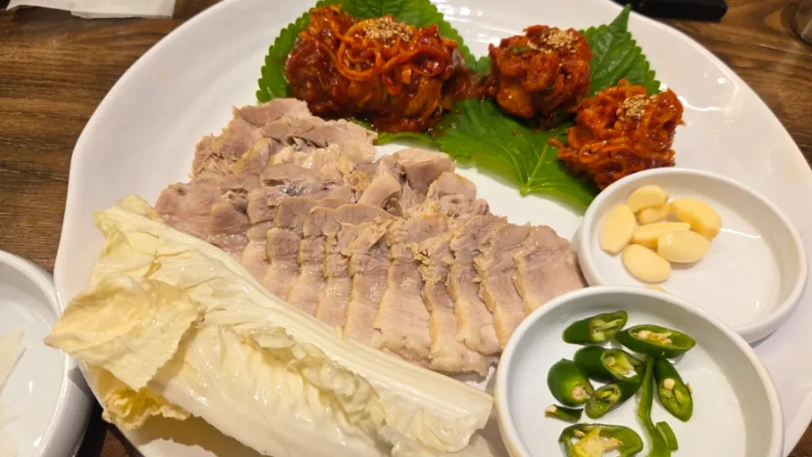 Vinegar, mustard, and pepper on the table
