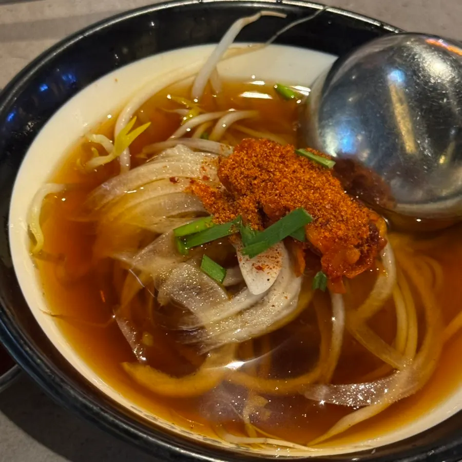 A bowl of free rice noodles served as a side