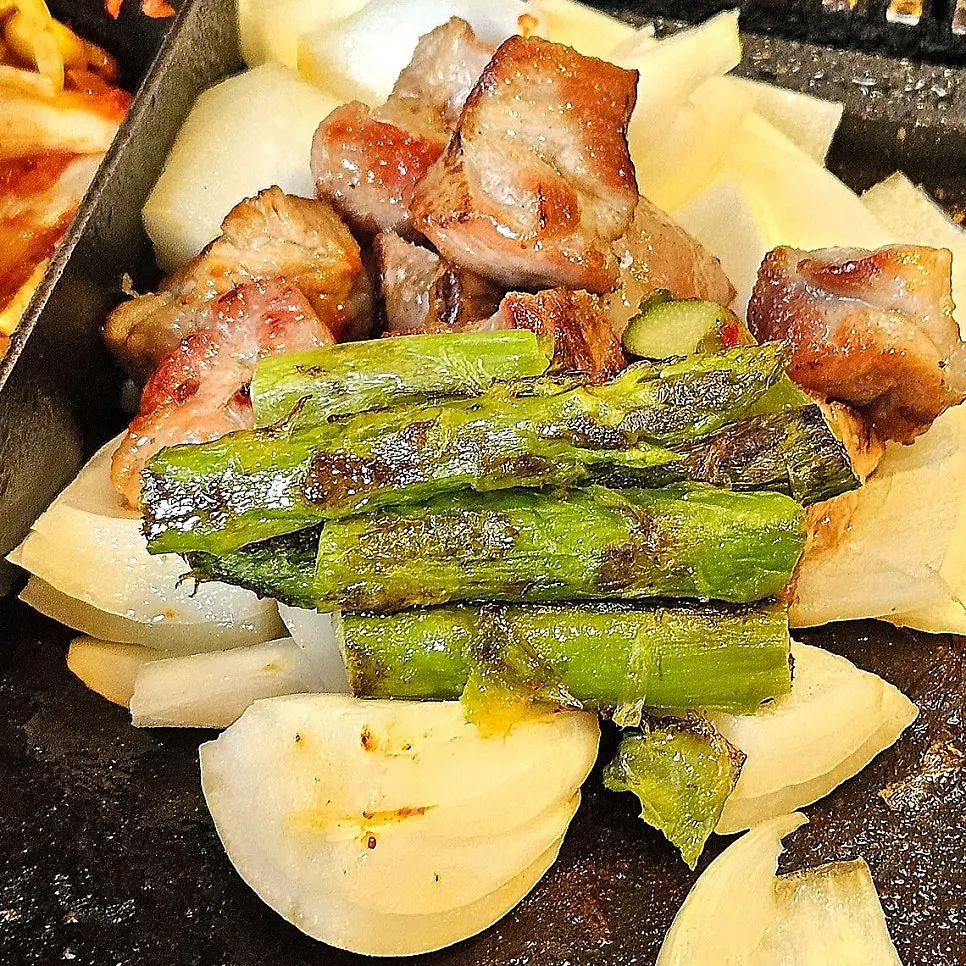 Pork belly on the grill at Ssosam 208 Siheung Baegot Branch