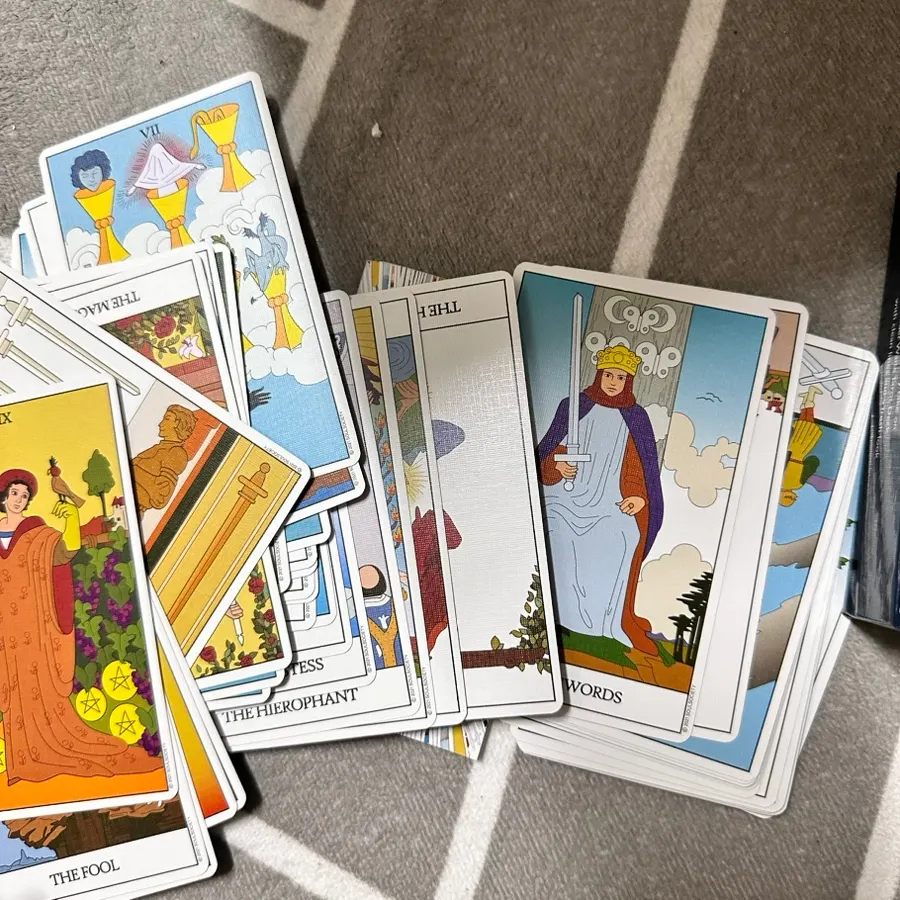 Using the cards while looking at the tarot guidebook