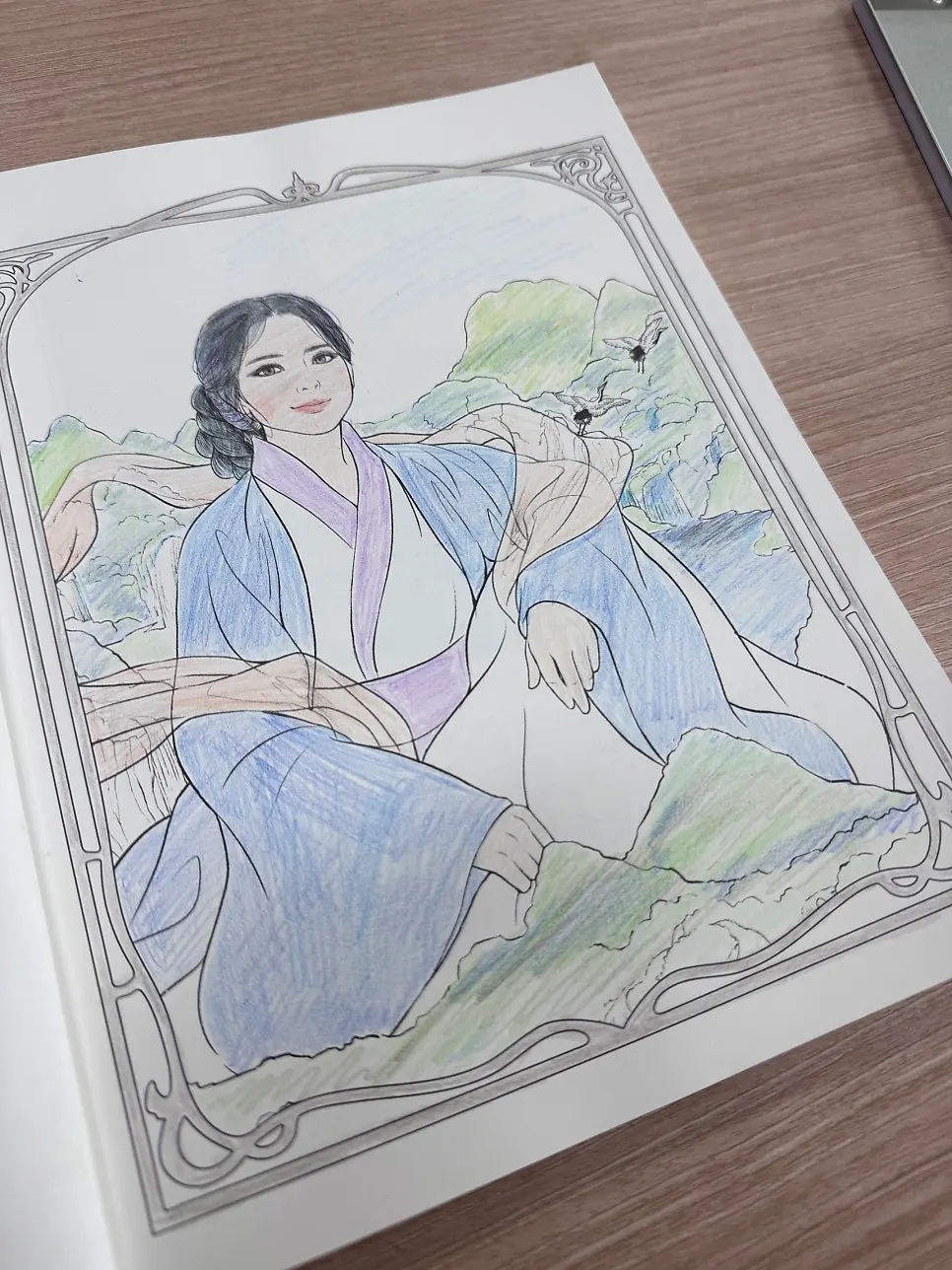 A goddess illustration being colored in