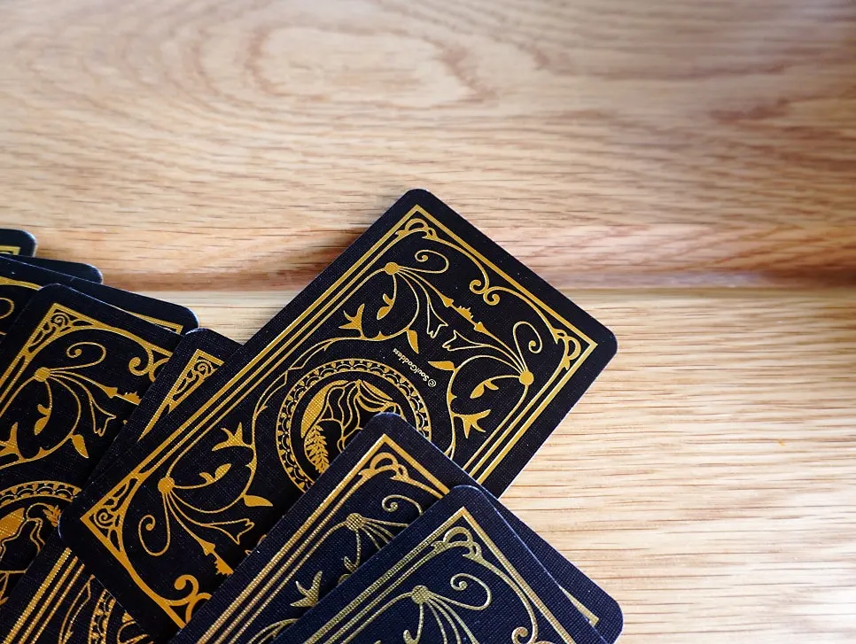 Tarot cards spread out in several rows