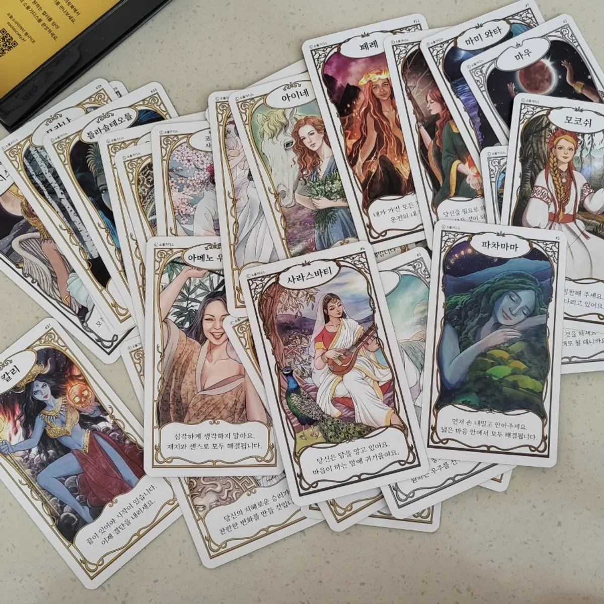Oracle cards with detailed goddess illustrations
