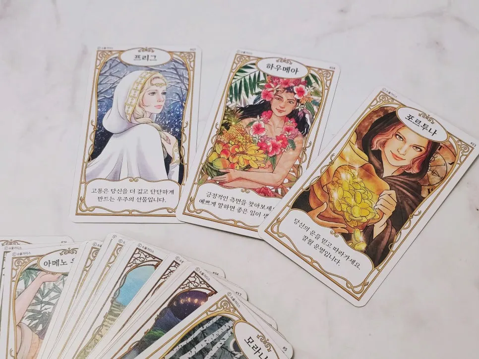 Thick oracle cards being shuffled