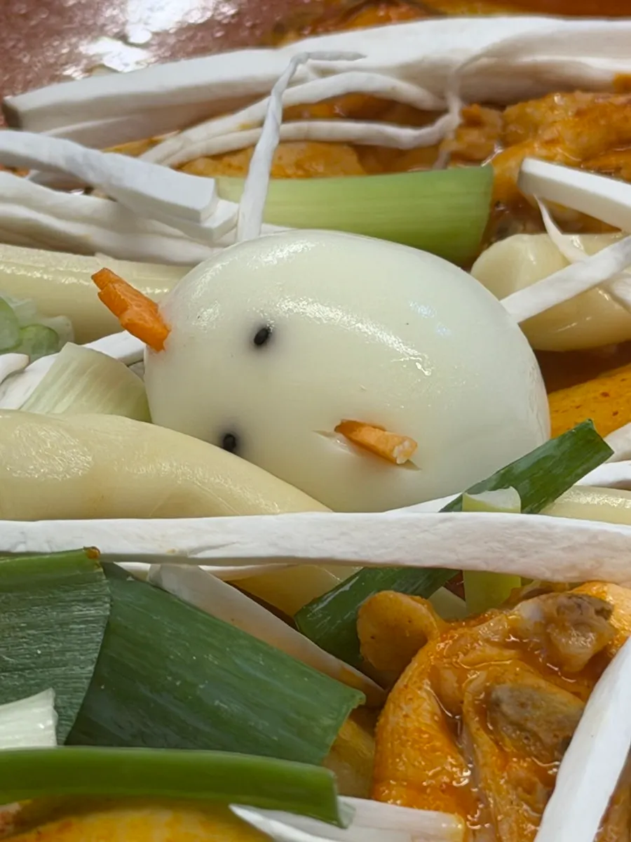 Basic side dishes being set out one by one