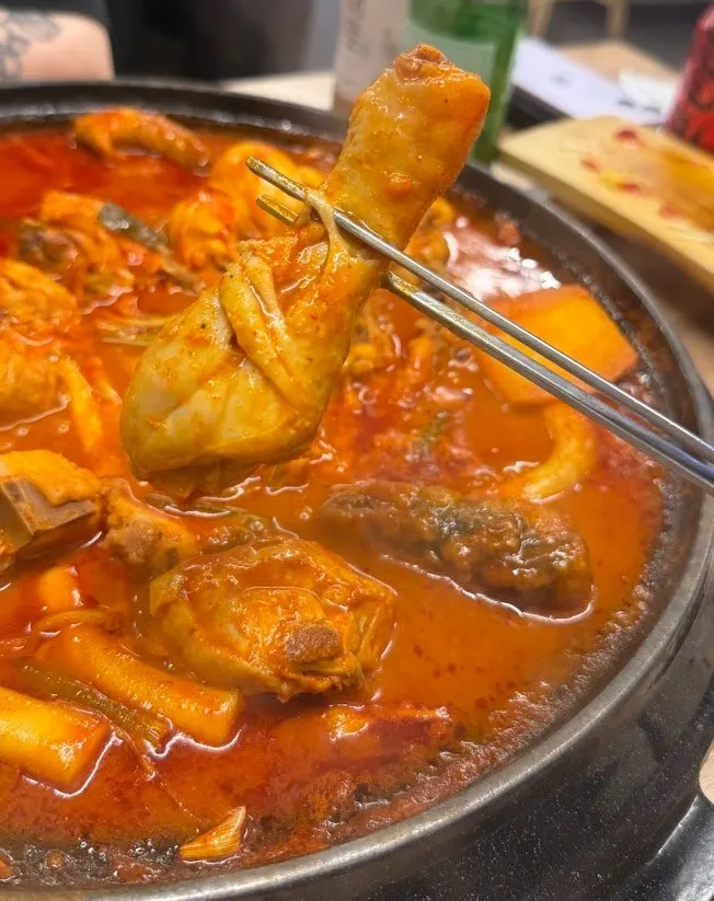 Chicken fished out after simmering thoroughly