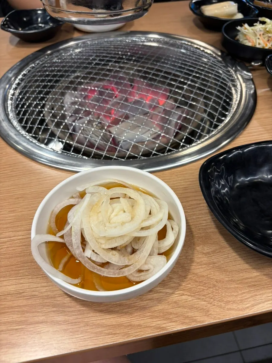 Cold vegetable salad and pickled onion side dishes