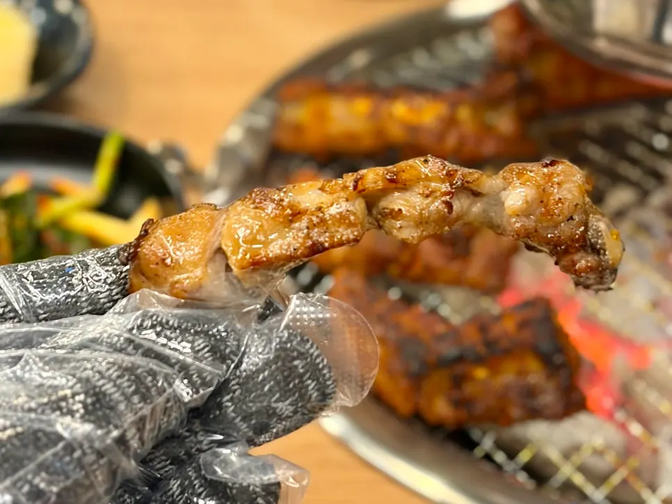 Marinated pork ribs grilling on the barbecue