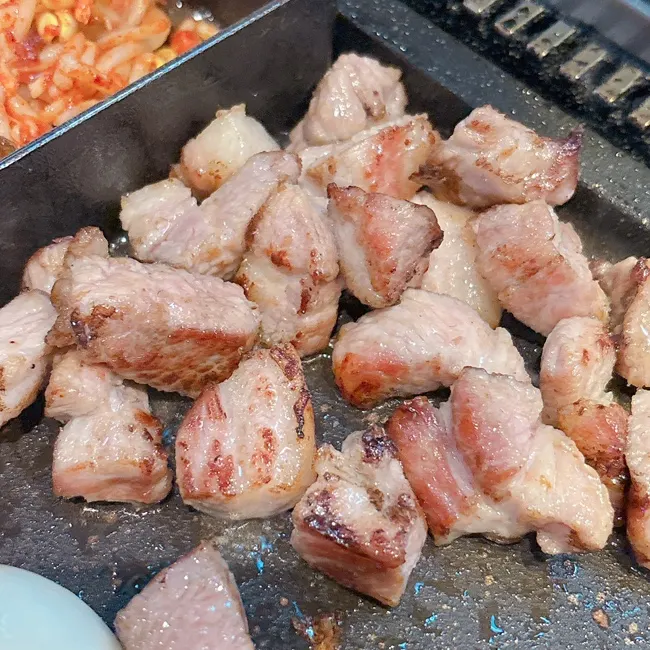 A well-grilled piece of marbled premium pork cut
