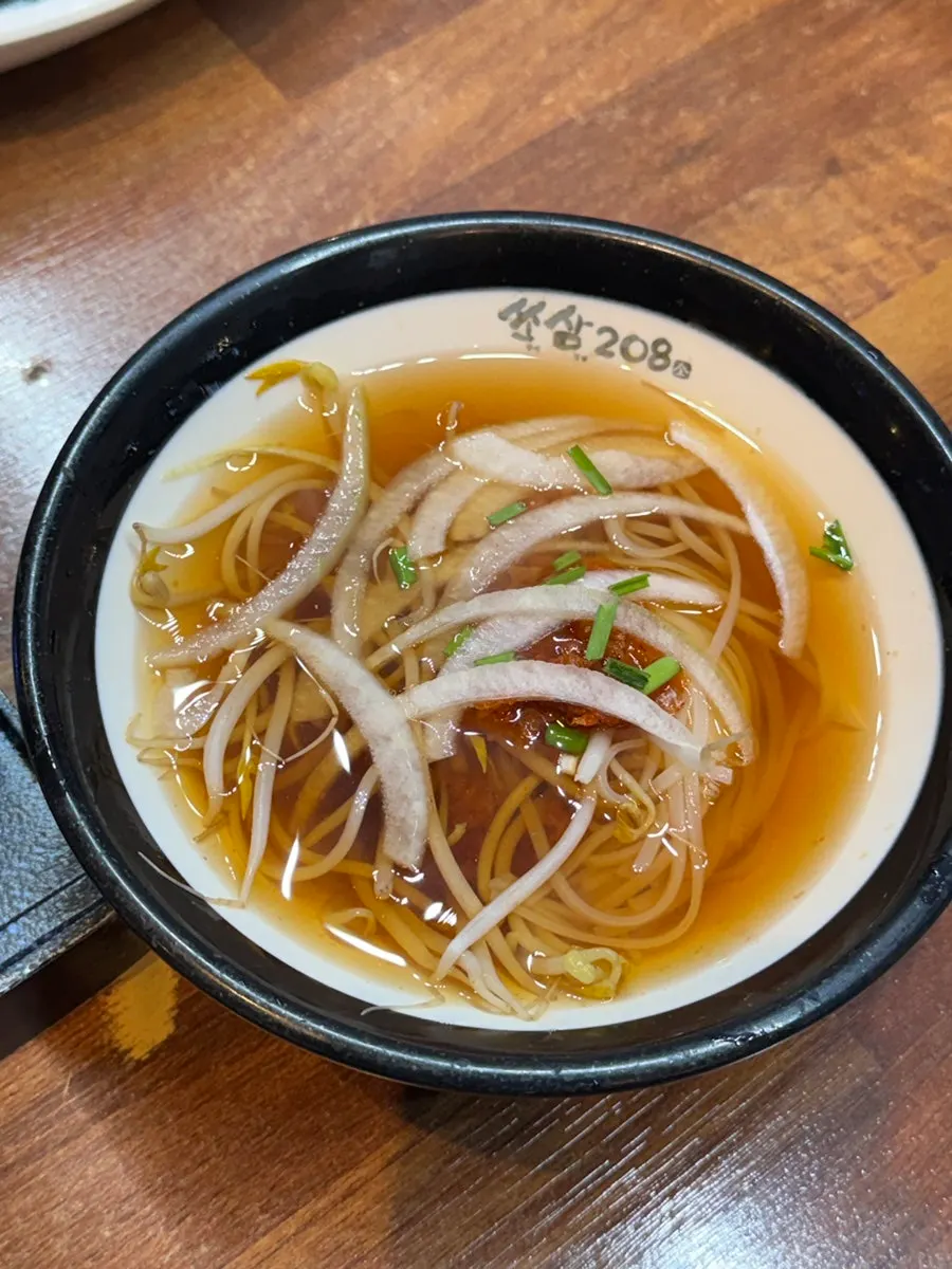 Complimentary spicy kimchi pho served at Ssosam 208