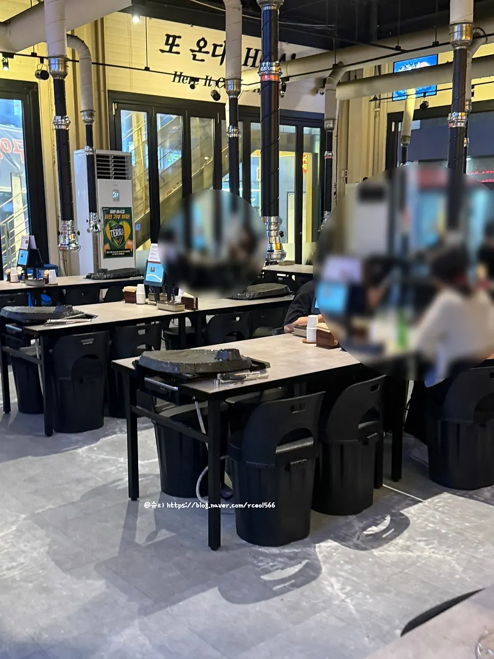 Interior view showing widely spaced tables