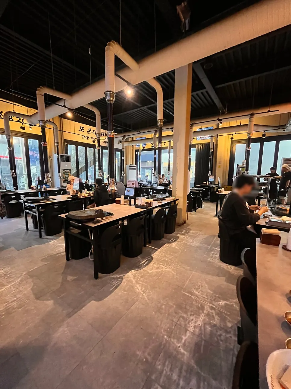 Retro-style interior of the BBQ restaurant with soft lighting