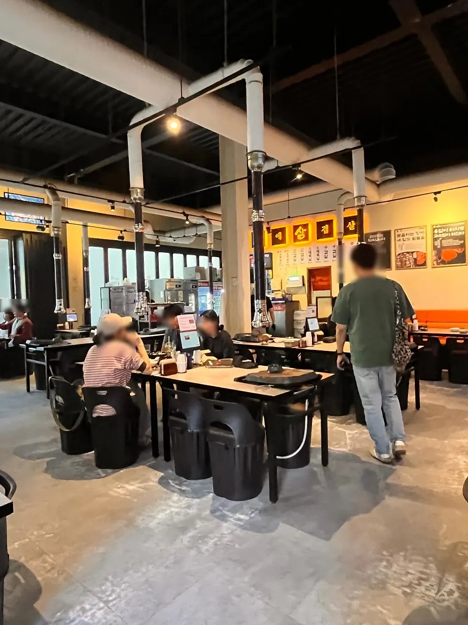 Spacious interior with multiple tables
