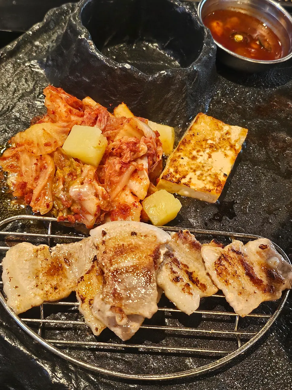 A golden-grilled piece of pork belly