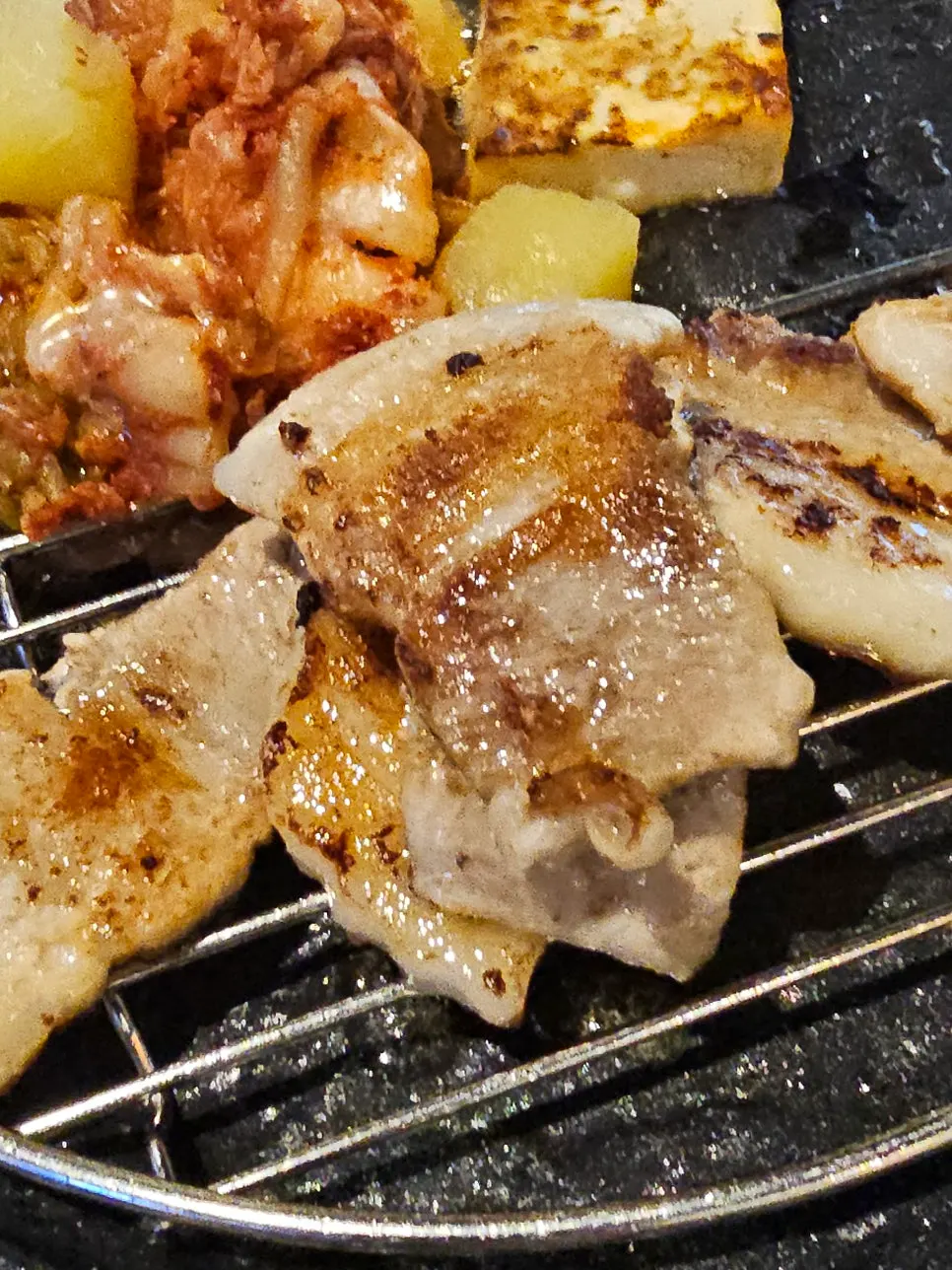 Pork belly grilling on the volcano stone pan