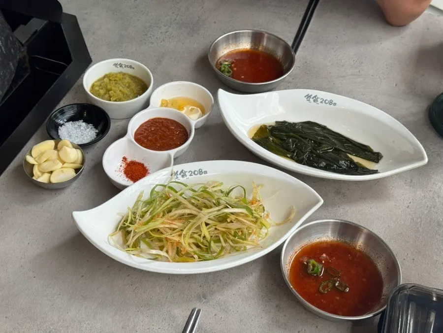 Basic side dishes served at Ssosam 208 Suwon Station Branch