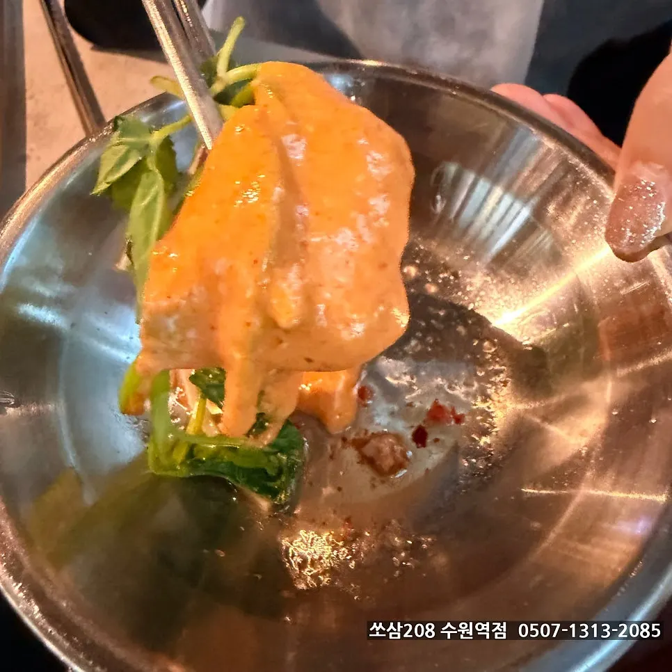 Pork belly dipped into the lava fondue cheese
