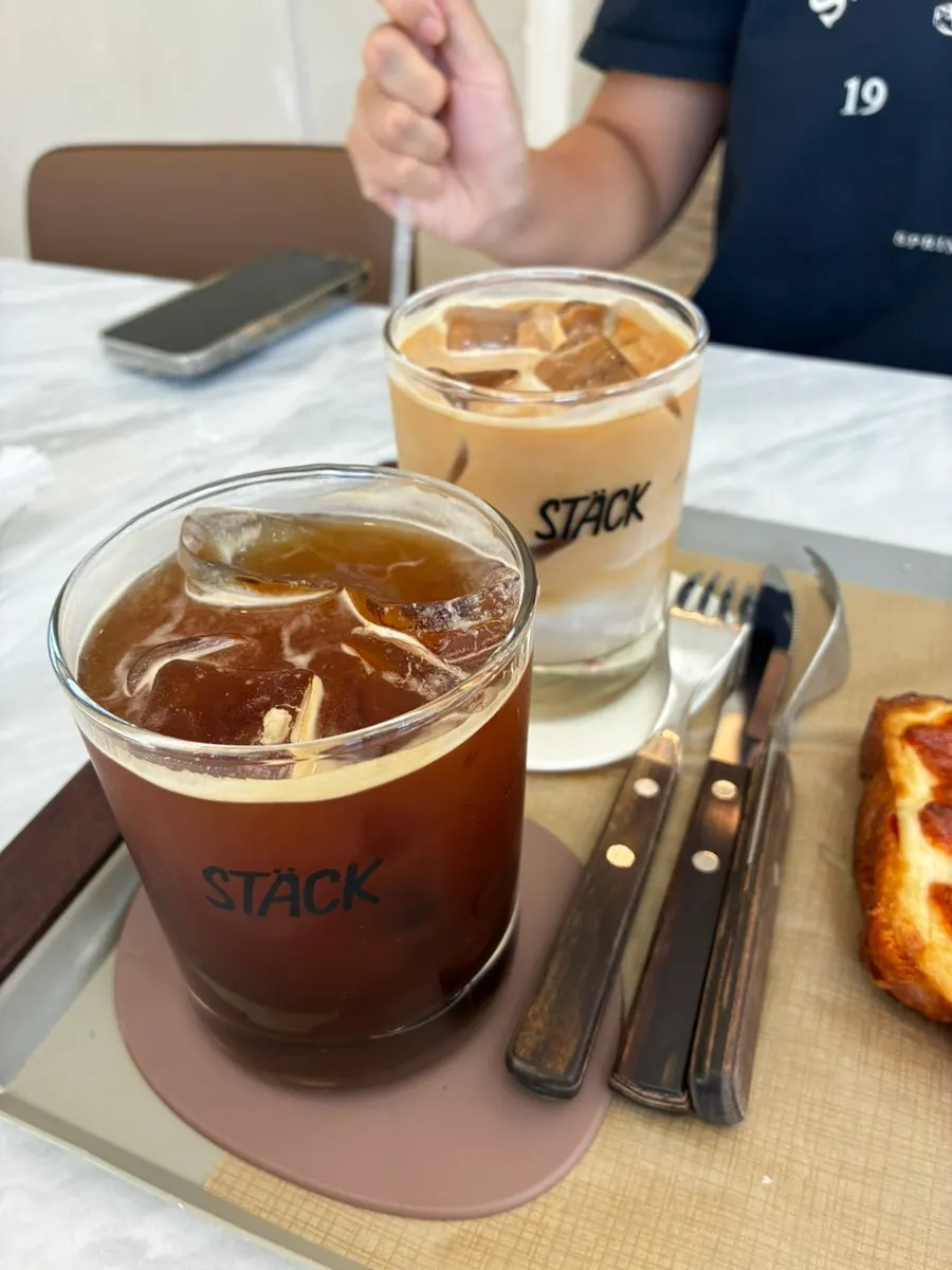 Iced americano on a second-floor table