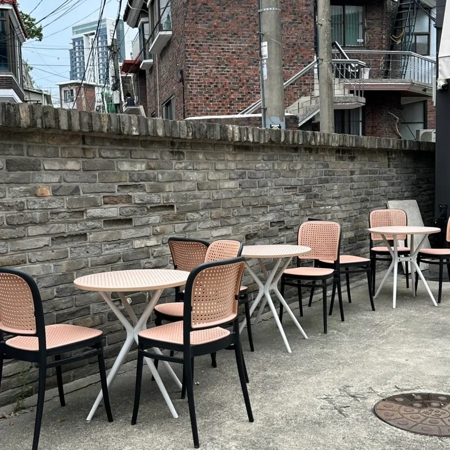 Entrance of Stack Bakery with outdoor seating in front