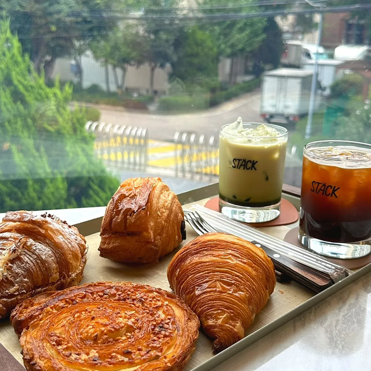 Window table with greenery visible outside
