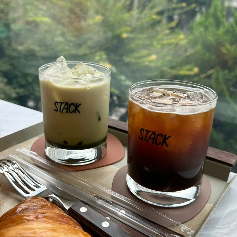 Drinks and bread on the window table