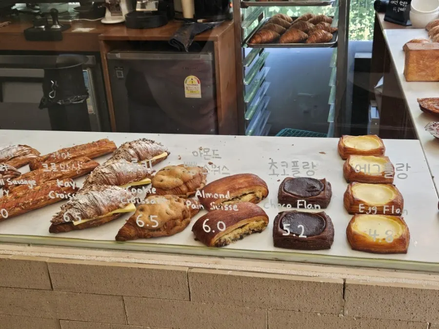 Display of kouign-amann, pain suisse and other pastries