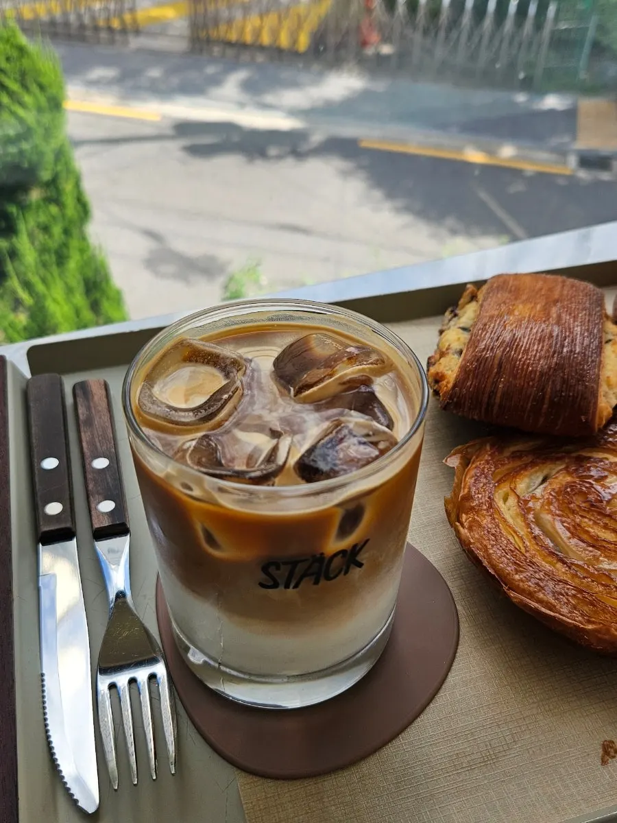 Bread and iced caffe latte on the 2nd floor table