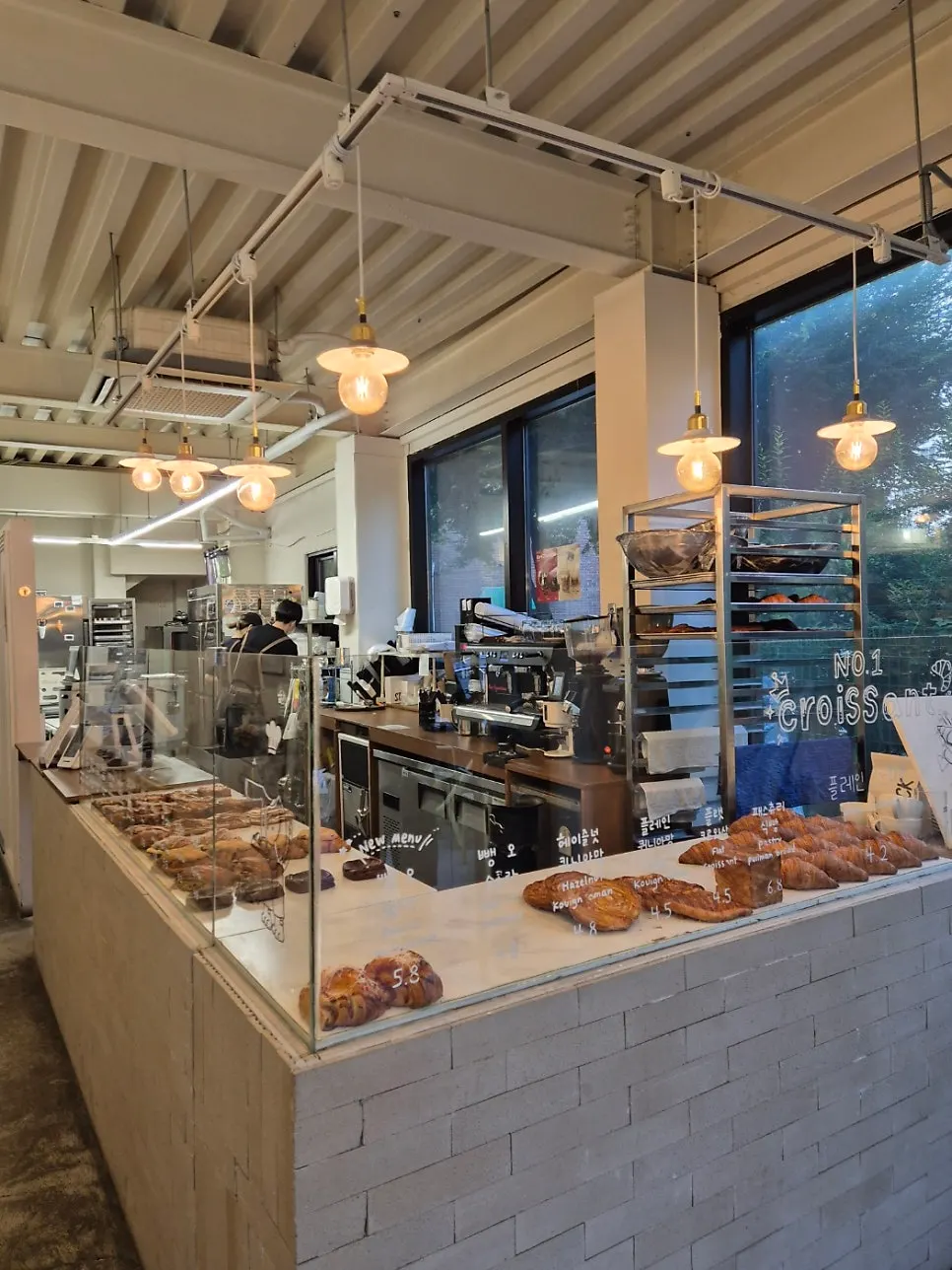 1st floor of Stack Bakery with only a display case and register, no tables