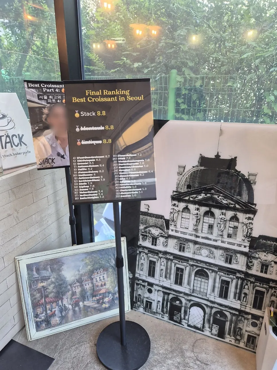 Signage about a broadcast filmed at the café