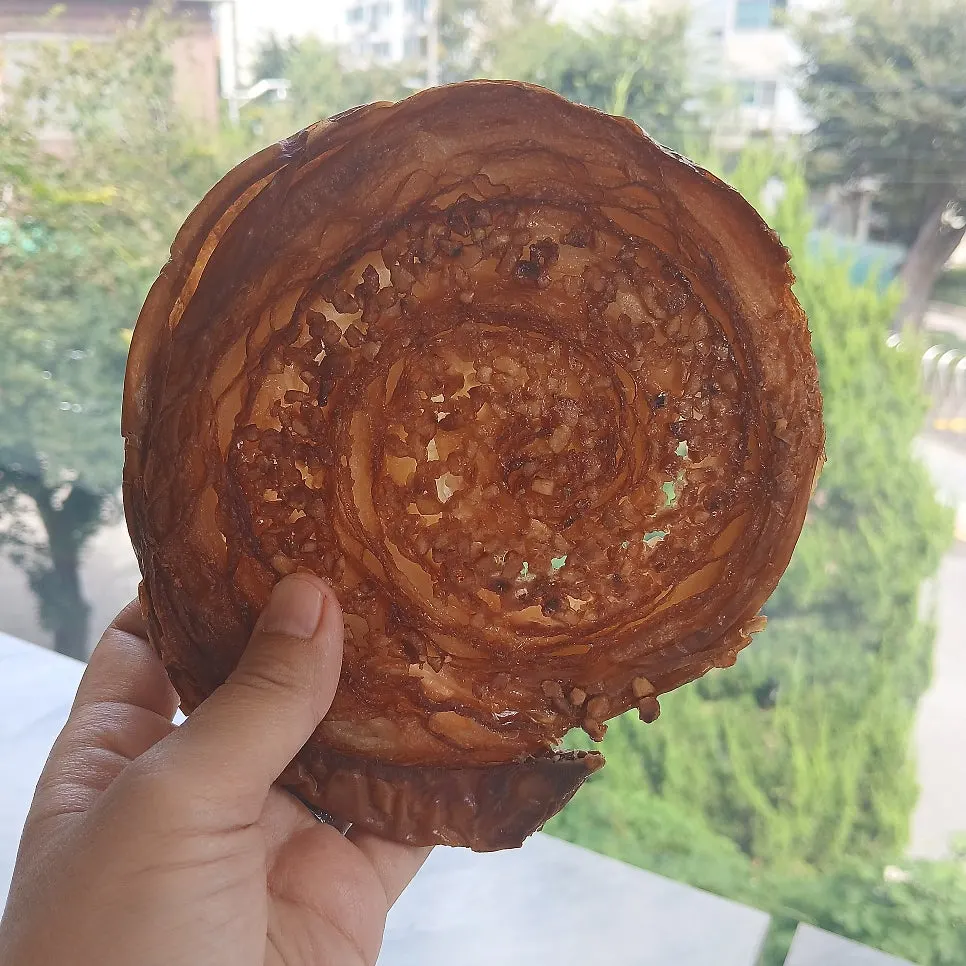 A single hazelnut kouign-amann