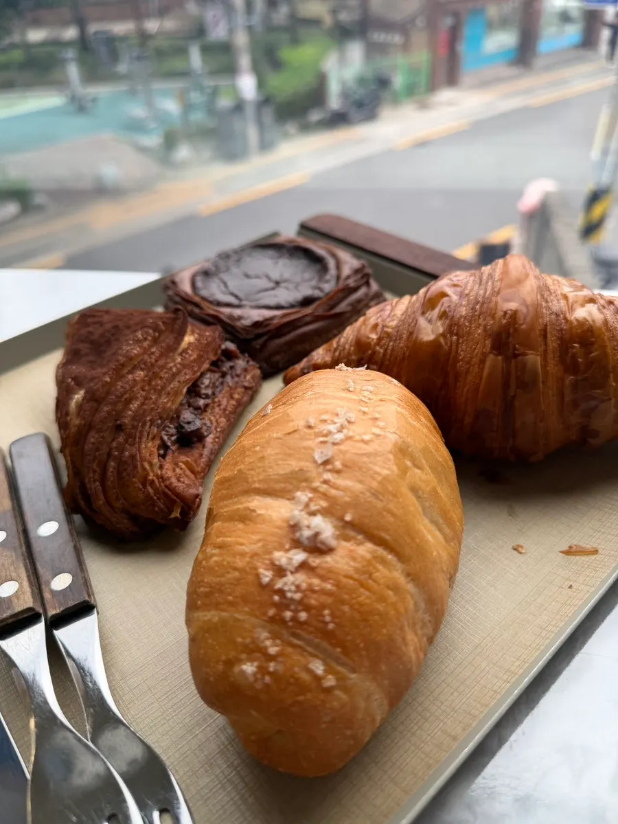 Drinks and bread laid out on the table