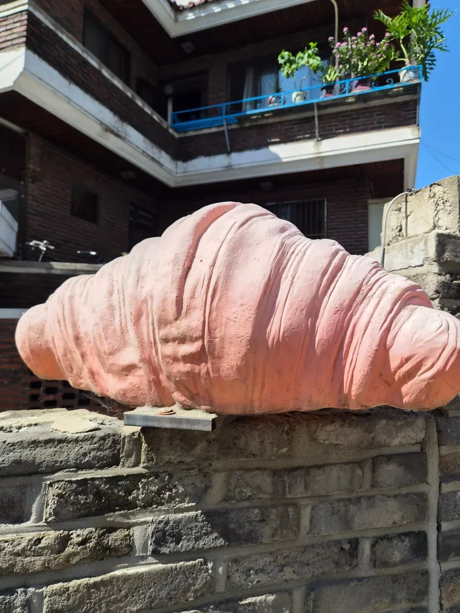 Stack Bakery entrance with a big croissant model hanging