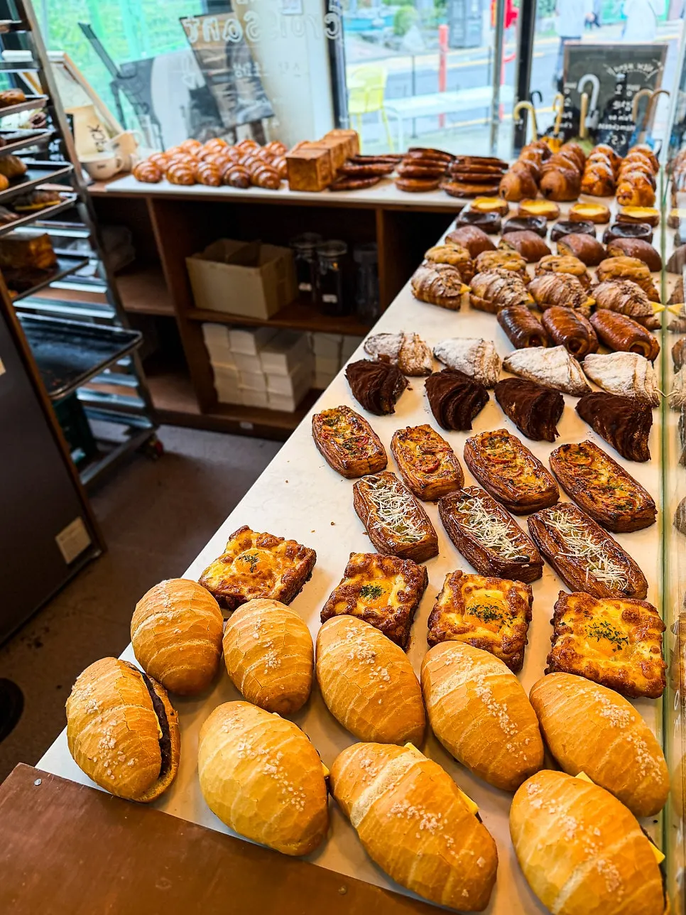 Drinks and bread placed on a table at Stack Bakery