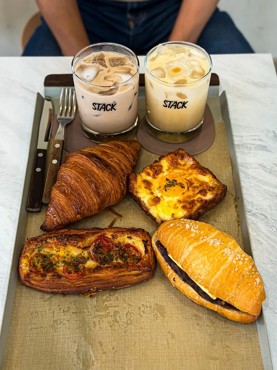 Table with ordered drinks and bread