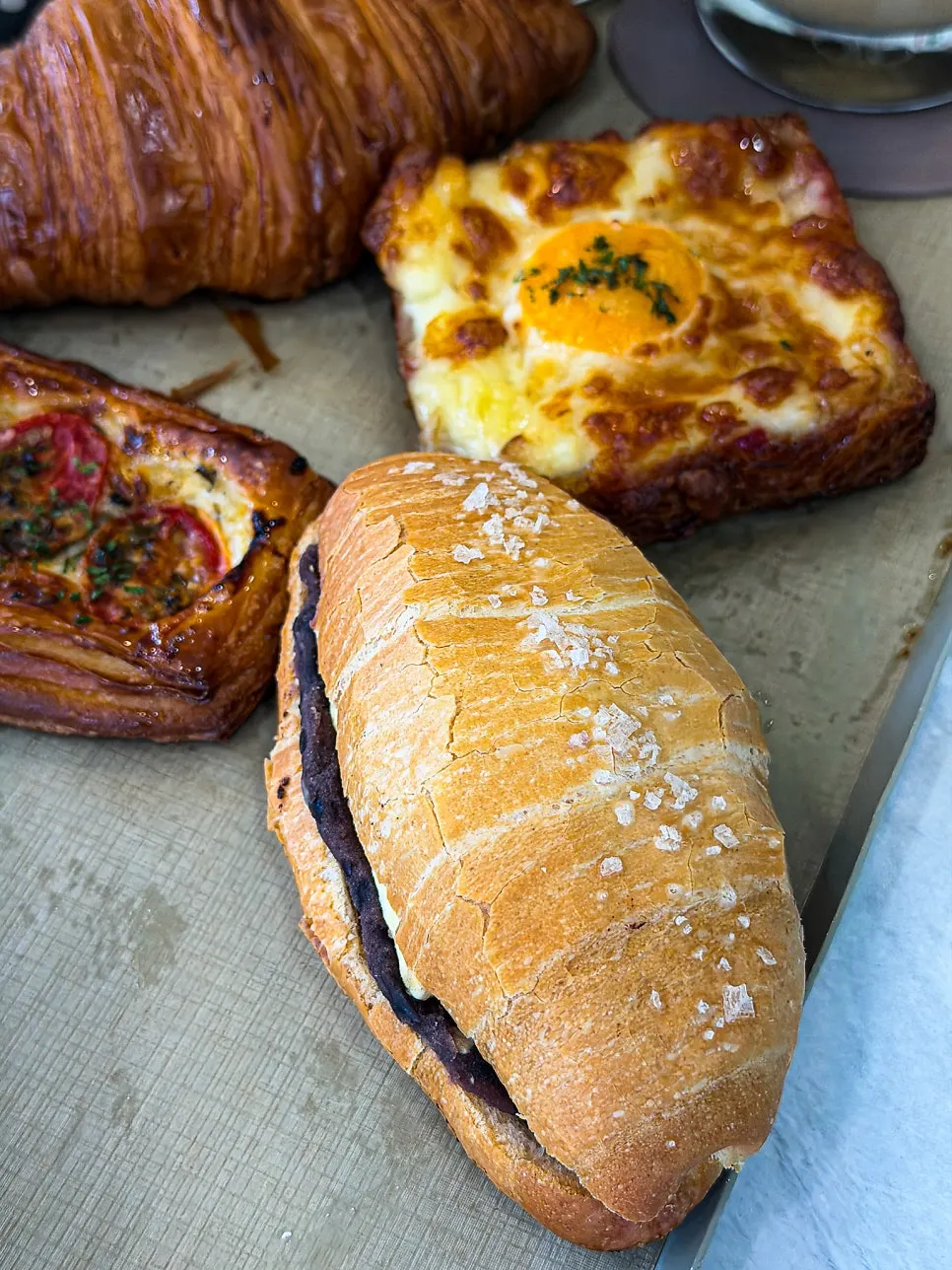 Cross-section of angbutter salt bread with whole red beans and thick butter