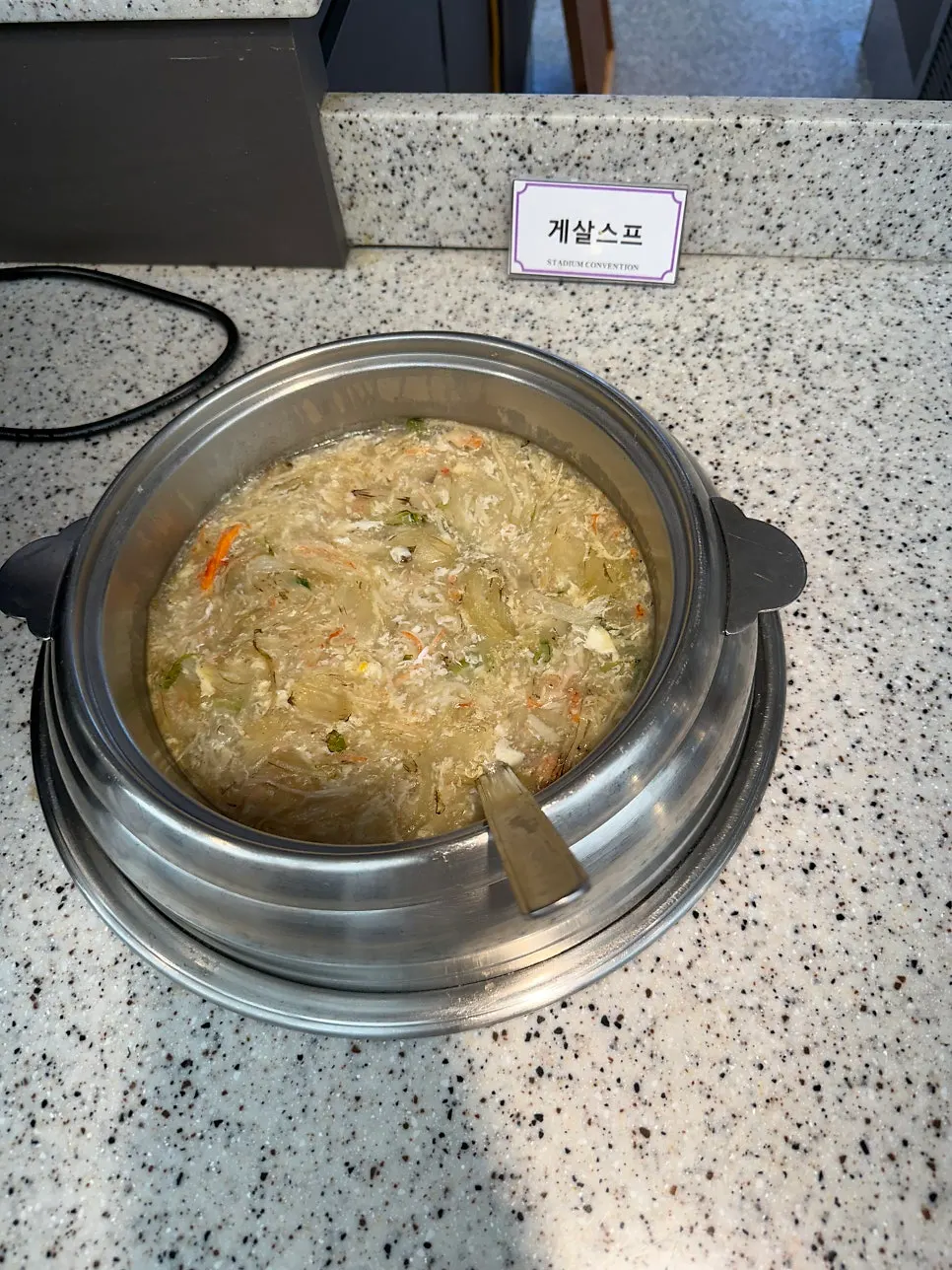 Display of Korean side dishes at the buffet