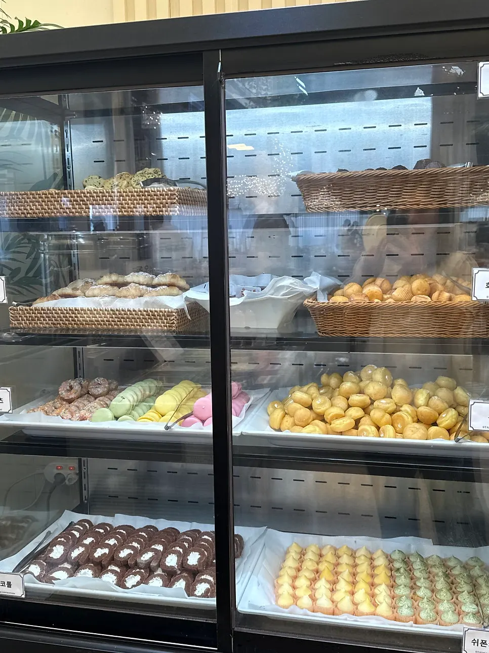 Dessert corner with fruit, cake, and macarons