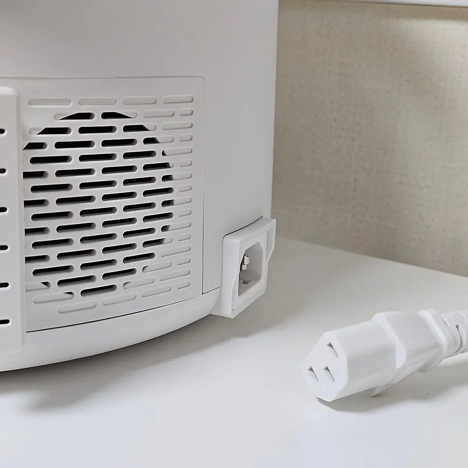 Moving the humidifier with the power cord disconnected