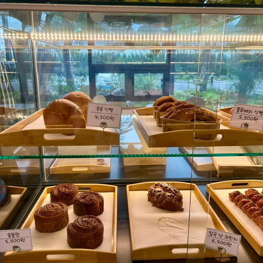 Milk bread and other bread varieties on the display case