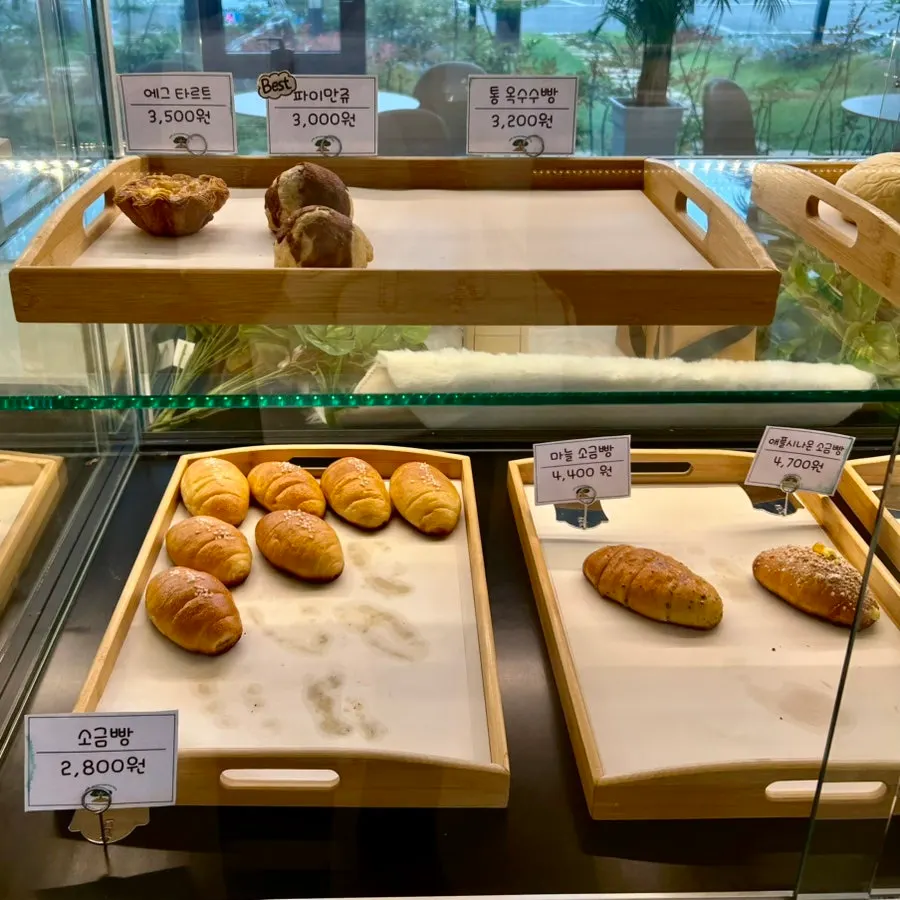 Bakery display case with soboro bread and manju