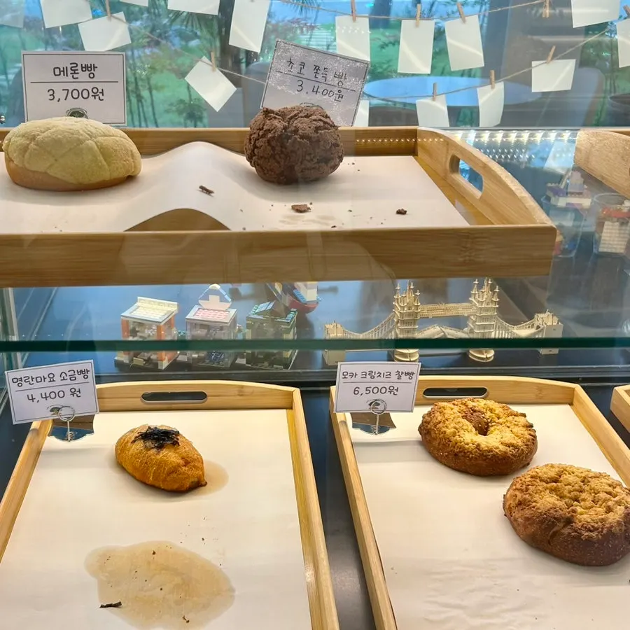 White rolls and cakes on display