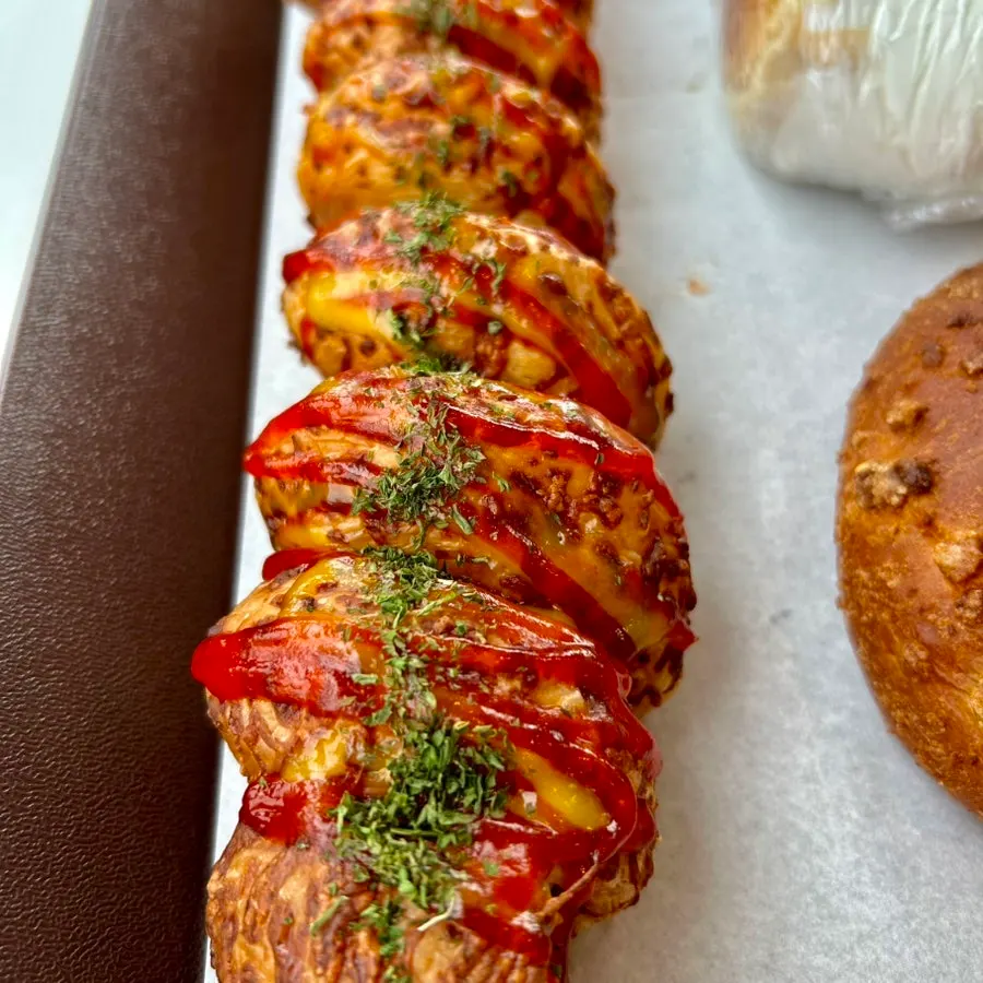Long sausage bread on a plate