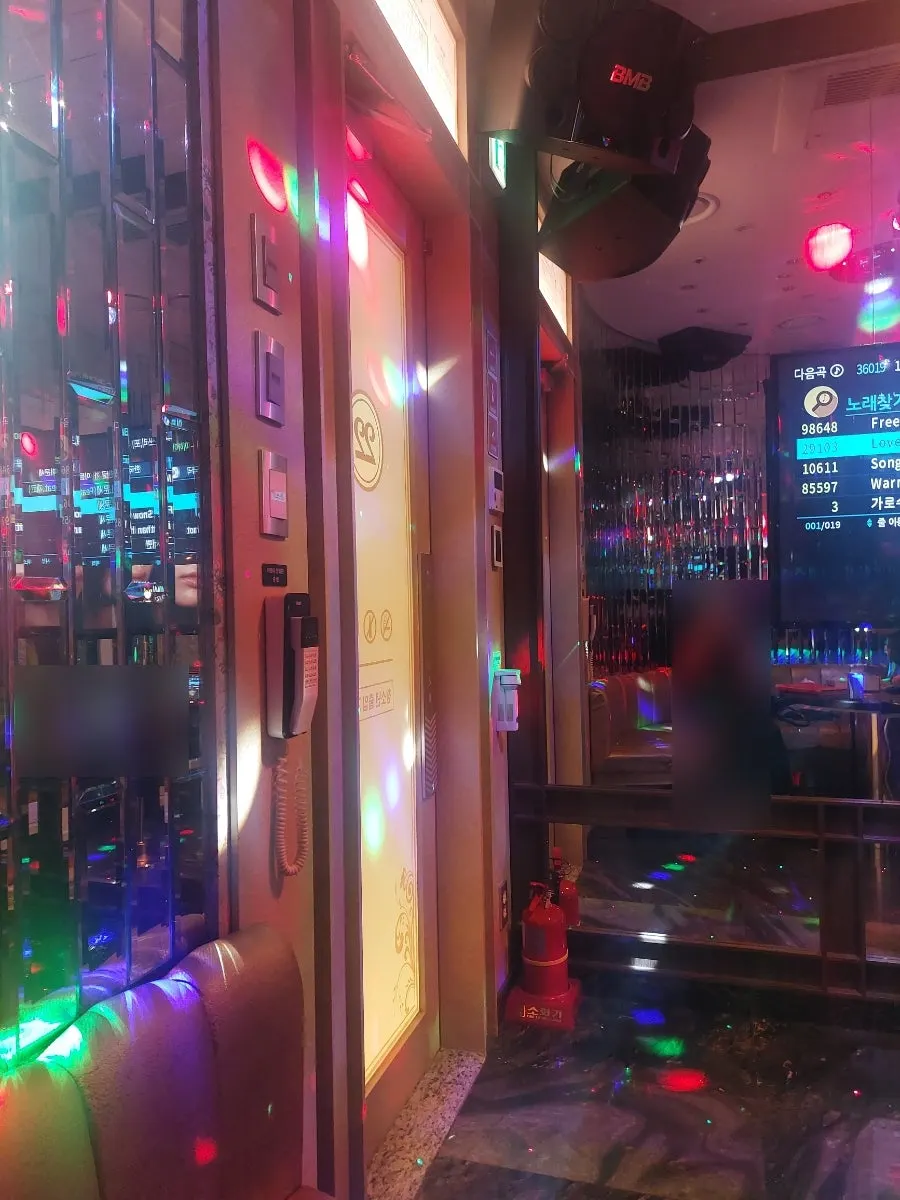 Interior of the karaoke room with lighting on